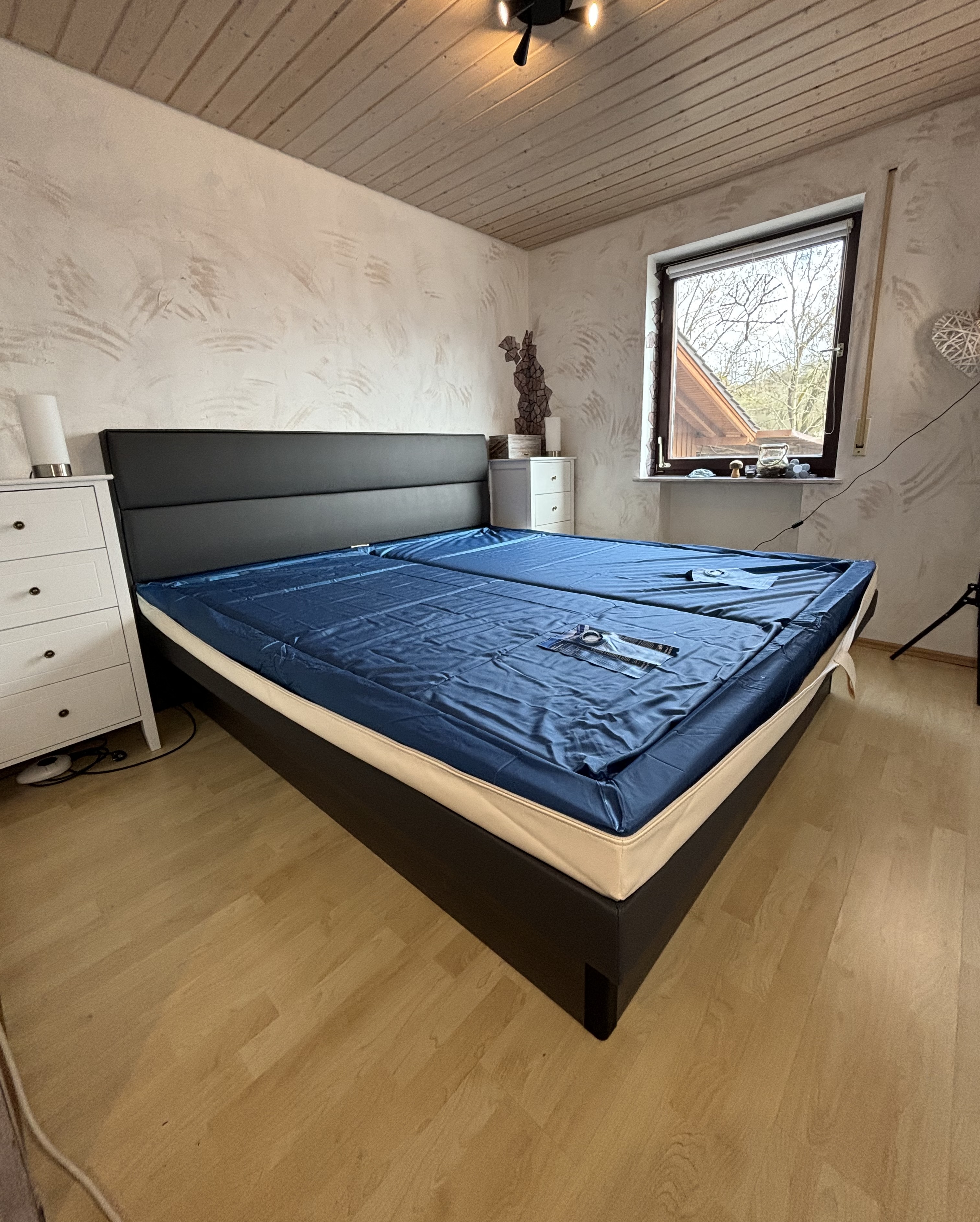 Modern bedroom detail showing textile textures